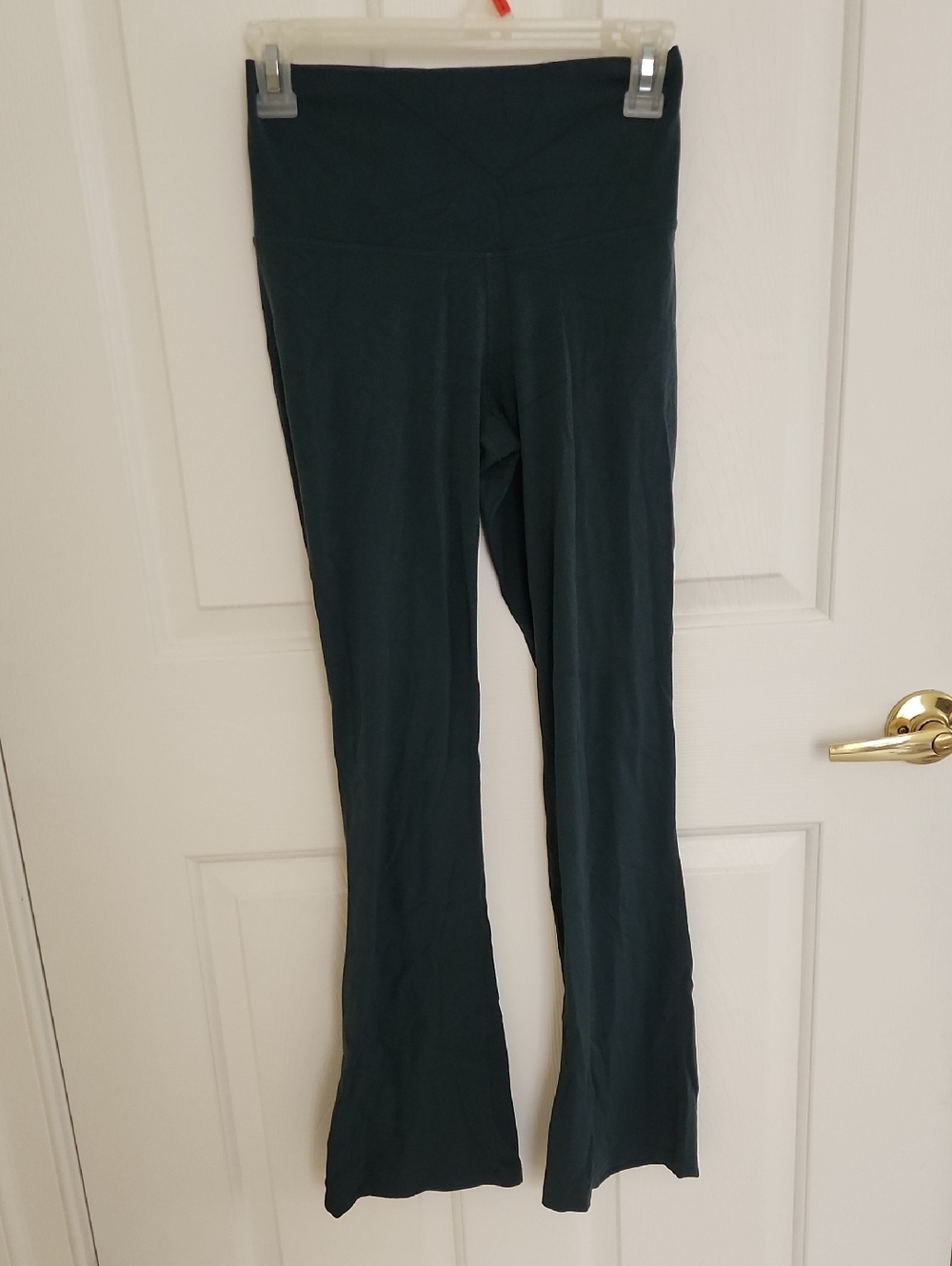Nike High-Waist Flared Pants in Dark Green – Womens